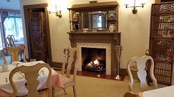 Dining Room Fireplace at Garden and Sea Inn